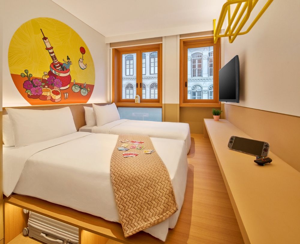 A photo of the interior of the Nano Twin room at lyf Chinatown Singapore