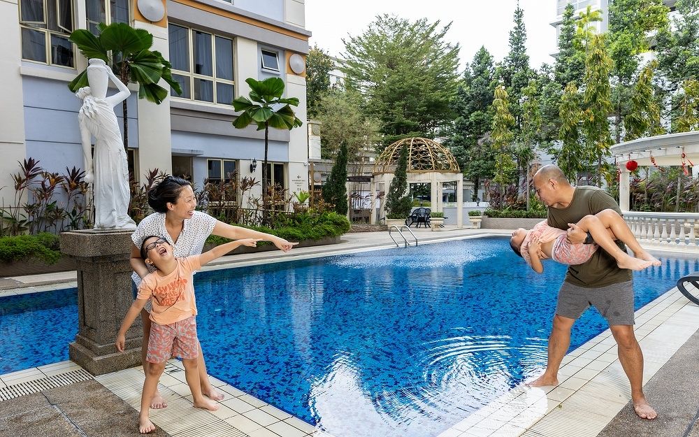 The family at their condo pool