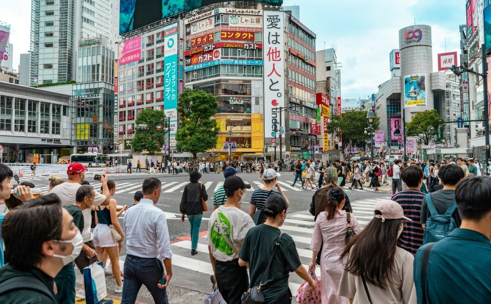 Shibuya crossing in Tokyo, Japan, in daytime.