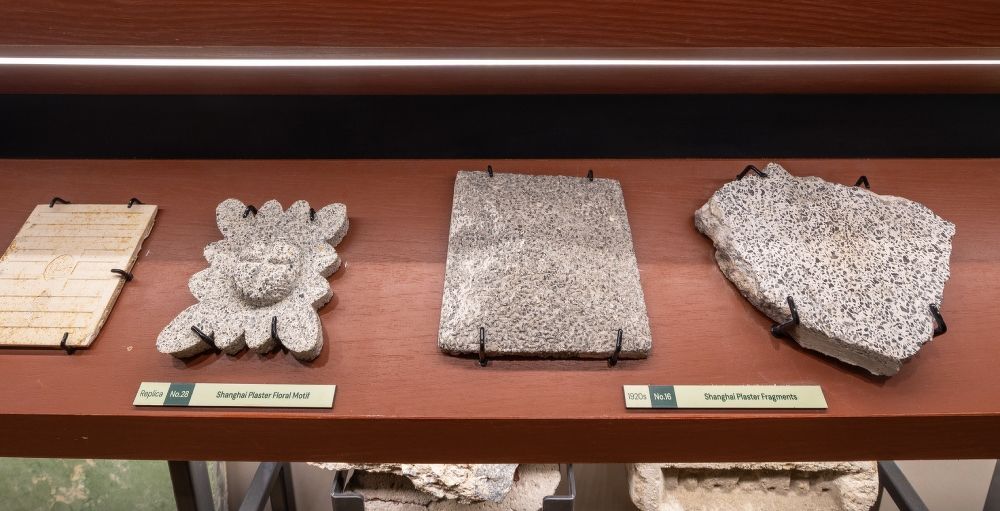 Heritage material library with Shanghai plaster fragments at Temasek Shophouse