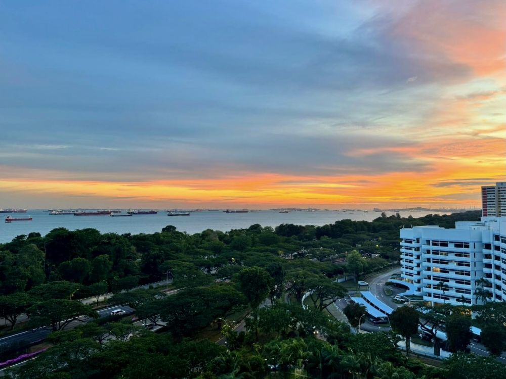 Unblocked view and sunset from the balcony at Seaside Residences condominium in Siglap