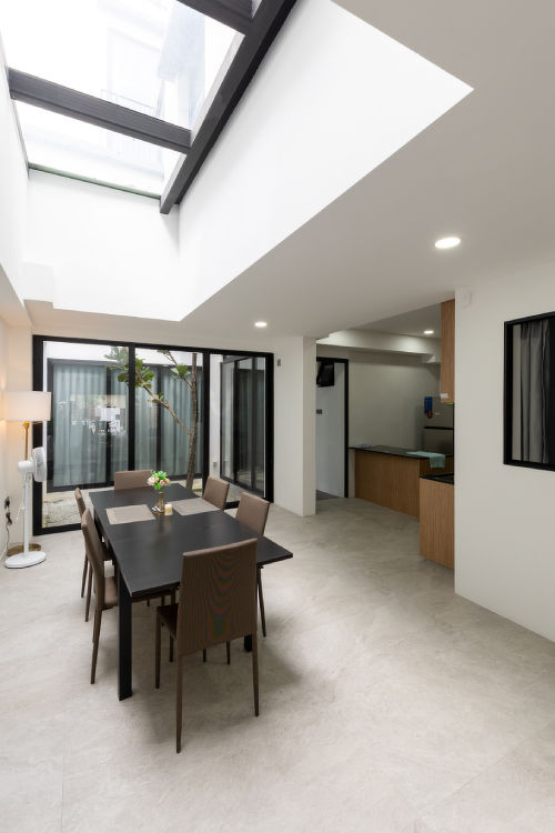 Kitchen and dining area at 66 Yunnan Crescent, managed for co-living