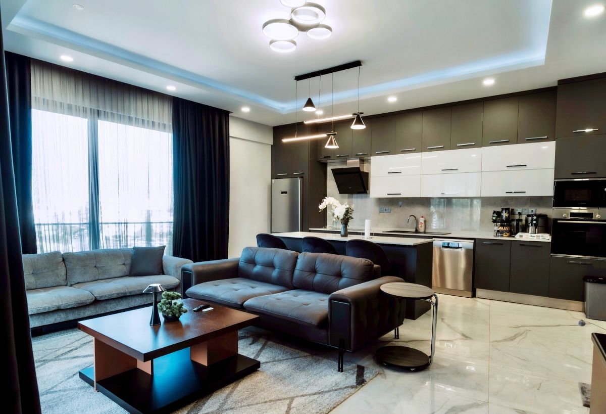 Apartment interior in a condominium with living room and kitchen