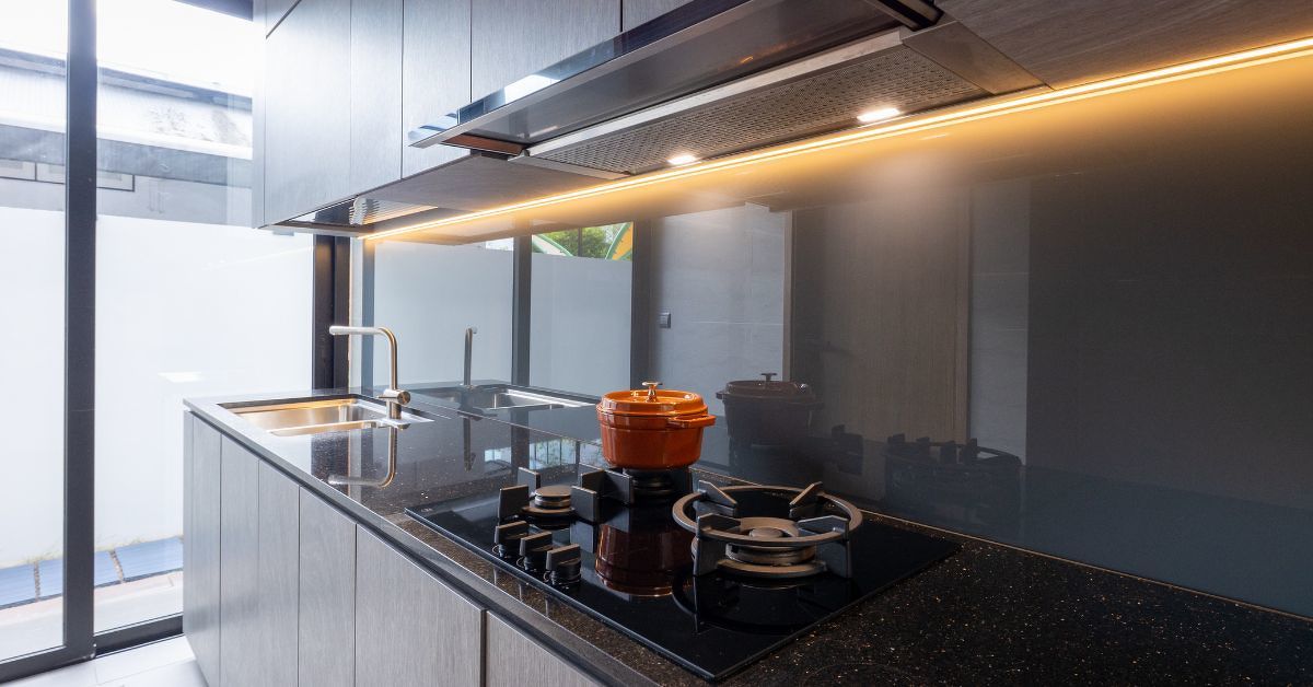 The home's wet kitchen houses the primary cooking area, keeping heavier meal preparation separate from the main living spaces