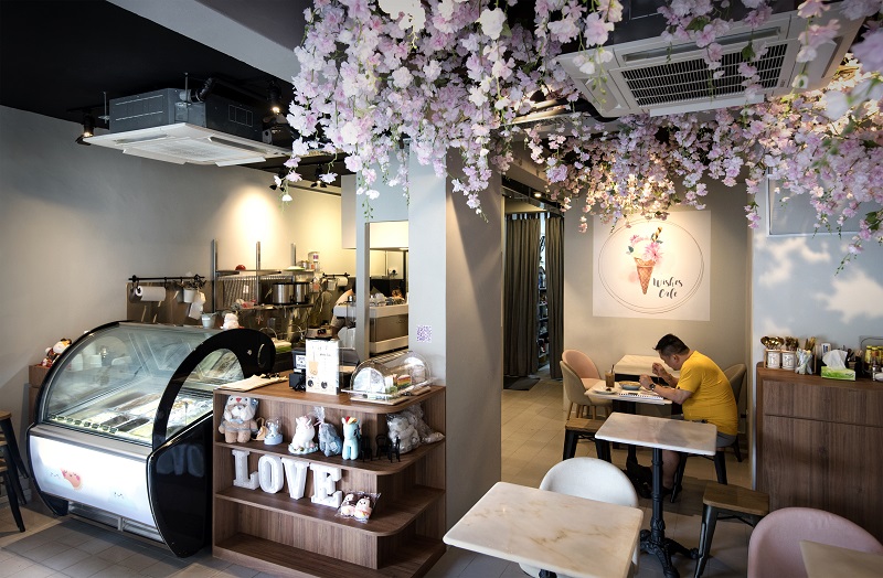 MACPHERSON -  With its sakura-themed interior, Wishes Café stands out among a row of provision shops and clinic 